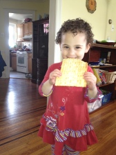 Annsley's daughter with gluten-free matzah